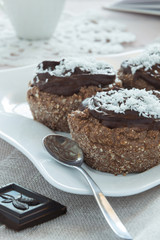 Close up of chocolate cakes on a white plate