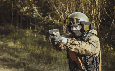 Fototapeta premium The man in the image of a member of the special forces division. Russian police special force - Special Rapid Response Unit or SOBR (Spetsnaz).