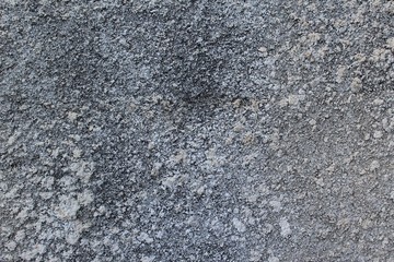 Old concrete textured background. Little scratches and cracks on the wall surface.