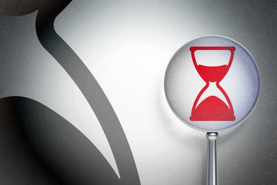 Timeline concept:  Hourglass with optical glass on digital background