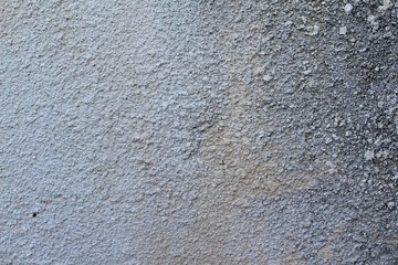 Old concrete textured background. Little scratches and cracks on the wall surface.