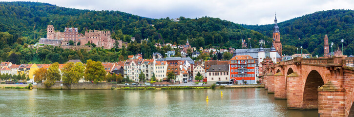 Fototapeta na wymiar Impressive medieval town Heidelberg. view with famous castle and bridge Karl Theodor