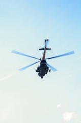 Fototapeta na wymiar helicopter in the sky,close up of a in flight in Russia