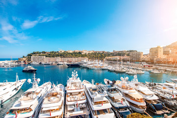 Landscape view on the bay with luxury yachts on the french riviera in Monte Carlo in Monaco - obrazy, fototapety, plakaty