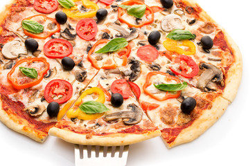 Pizza with ham, pepper and olives