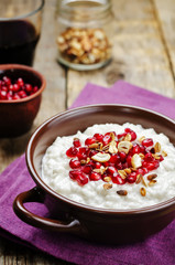 Coconut rice with pomegranate and granola