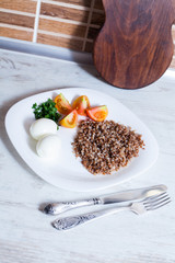 Healthy diet. Eggs, bread, buckwheat