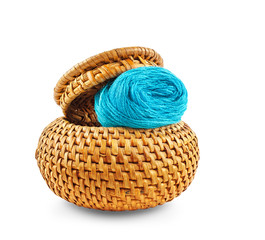 Wicker box of yellow color with dark blue thread