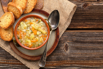 Autumn vegetable soup with toasts and space for text