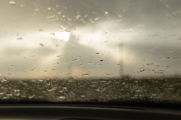 raindrops on a windshield of car