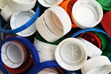 Composition with colorful plastic bottle caps