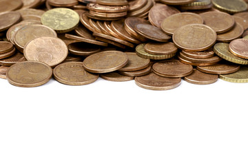 Heap of different eurocent coins with blank space at bottom