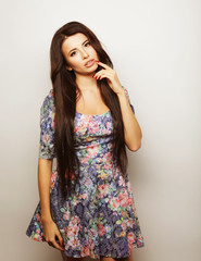 Beautiful brunette female in summer dress 