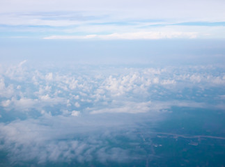 Beautiful cloudy sky abstract background concept related idea. View from airplane window