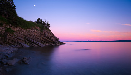 Purple sky and calm water