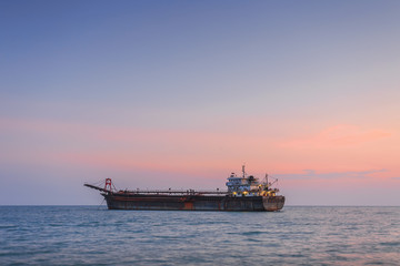 Cargo ship with Sunset.
