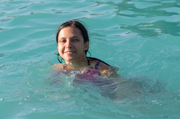 girl in a bathing suit in the water park