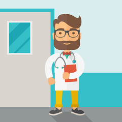 Young male doctor standing with stethoscope.