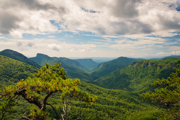 Fast moving clouds roll over the peaks of the Blue Ridge Mountains over the Linville Gorge Wilderness area in North Carolina