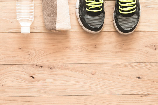 Fitness supplies on brown wood