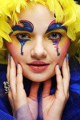 woman with yellow wig feather