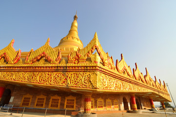 Fototapeta premium Golden stupa in Global Vipassana temple in Mumbai City, India.