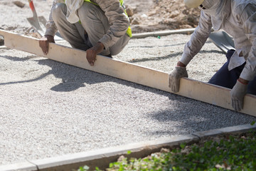 workers dub road sand and gravel