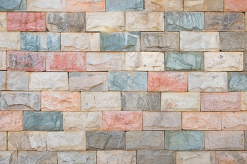 Multicolor of Stone ceramic Brick wall beautiful color texture background for art interiors design in home, house, building, shop, store, art store, coffee shop