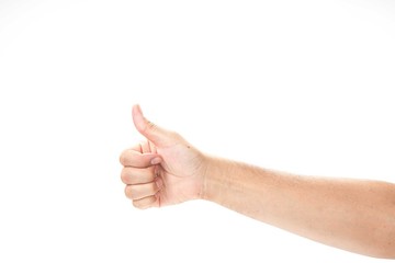 Closeup of male hand showing thumbs up sign against white backgr