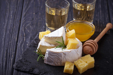 Camembert cheese with honey and wine