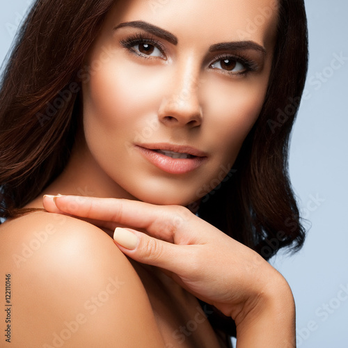 Young Woman With Naked Shoulders, On Blue Stock Photo 