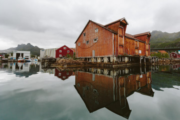 Building reflection in fjord