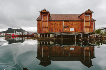 Building reflection in fjord
