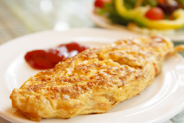 hot omelet with tomato sauce