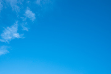 Fototapeta na wymiar bright blue sky with clouds