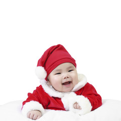 cheerful babies wearing santa claus suit for christmas or happy