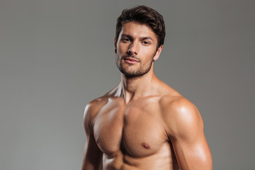 Fototapeta premium Close up portrait of a sexy man with naked torso