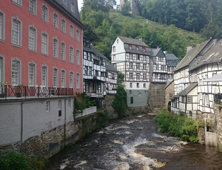 Fototapeta premium River in resort town of Monschau, located in the district Aachen, North Rhine-Westphalia, Germany 