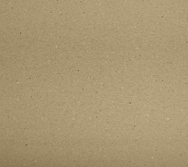 Old vintage brown cardboard paper texture for background.