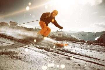 Photo sur Plexiglas Sports dhiver Skieur au coucher du soleil