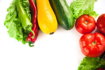 Fresh organic vegetables. Autumn vegetables. Harvesting. Ingredients for the salad. Lettuce, tomatoes, cucumbers, zucchini, eggplant, peppers, chillies. Advertising Space.
