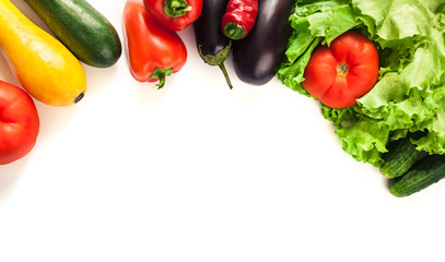 Fresh organic vegetables. Autumn vegetables. Harvesting. Ingredients for the salad. Lettuce, tomatoes, cucumbers, zucchini, eggplant, peppers, chillies. Advertising Space.