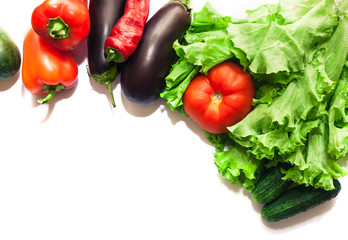 Fresh organic vegetables. Autumn vegetables. Harvesting. Ingredients for the salad. Lettuce, tomatoes, cucumbers, zucchini, eggplant, peppers, chillies. Advertising Space.