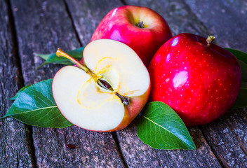 Red apples in wooden box. Copyspace