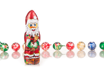 Santa Claus chocolate figure with xmas decoration