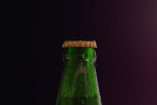 Beer Bottle with Droplet in the Dark Light, Fresh Cold Beer