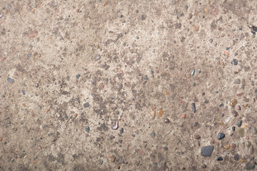Rough cement texture with rocks