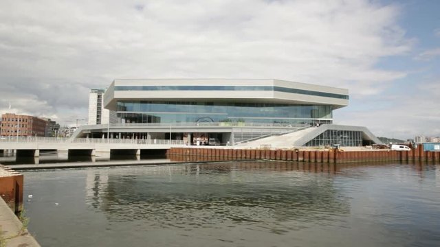 wide shoot pan over dokk1 and harbour from port side.01.08.2016.Location: Dokk1, Aarhus harbour, Denmark.Completed in 2015, the 35,600m&sup2; facility is the largest public library in Scandinavia.