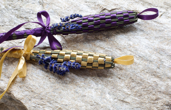 Fototapeta Fragrant wands made from fresh lavender. Rocky background