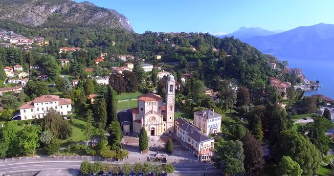 Aerial 4k - Tremezzo - Lago di Como (IT) - Chiesa di San Lorenzo (1775-1894) - Parco Mayer - Panoramica aerea